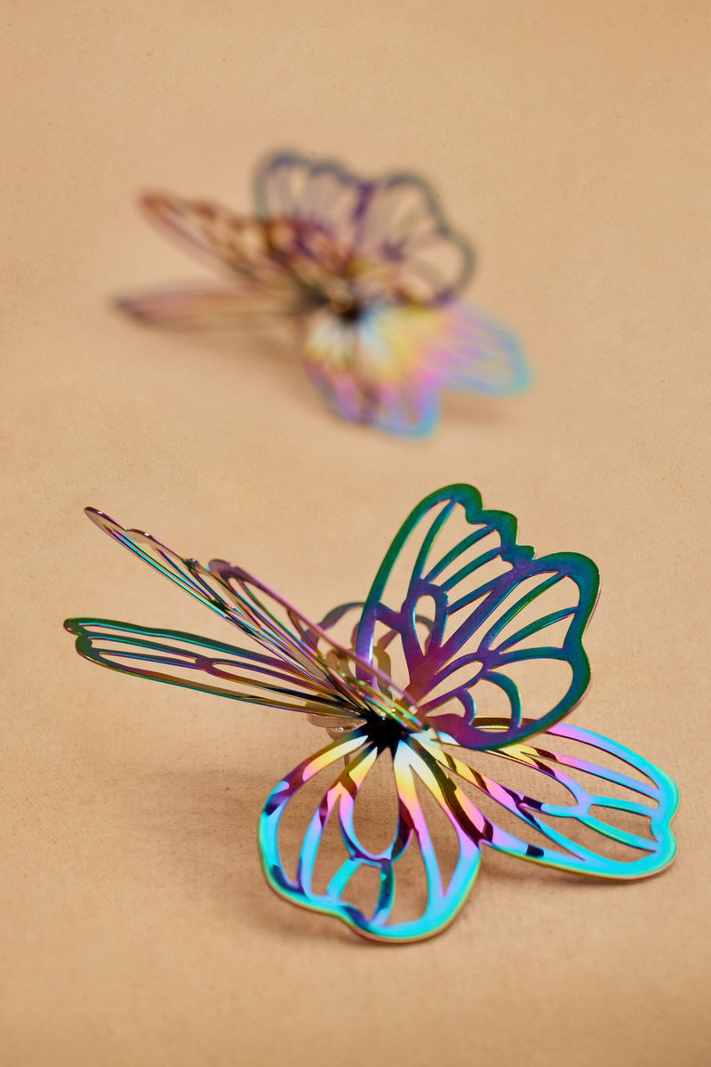 Close-up view of EYDI rainbow butterfly earring